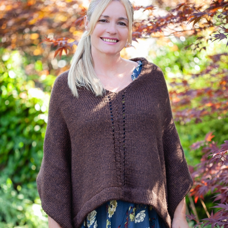 Loom knit poncho/cape pattern by This Moment is Good. The Rebecca Poncho has bea