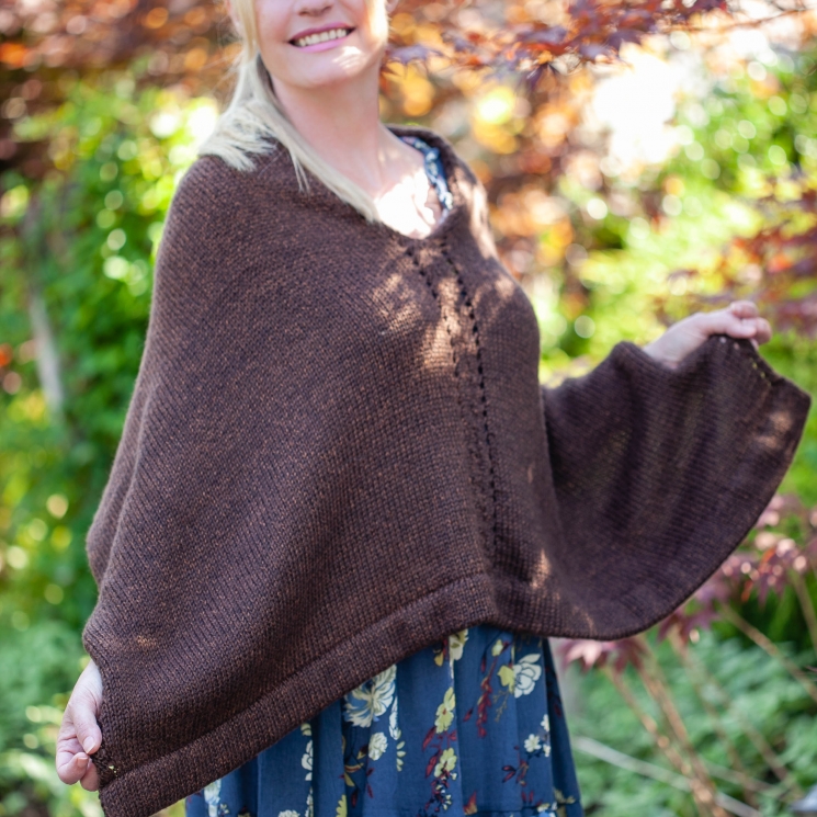 Loom knit poncho/cape pattern by This Moment is Good. The Rebecca Poncho has bea