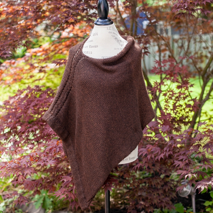 Loom knit poncho/cape pattern by This Moment is Good. The Rebecca Poncho has bea