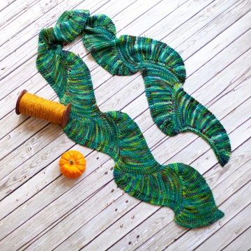 Loom knit wavy accent scarf pattern. Loom knit wavy accent scarf pattern.